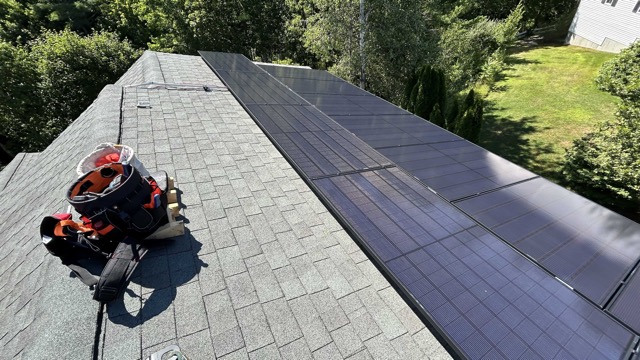 One of 2 roof faces filled with REC 420 watt panels